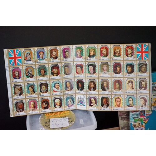 460 - A collection of British and world stamps within albums and loose examples together with stamp catalo... 