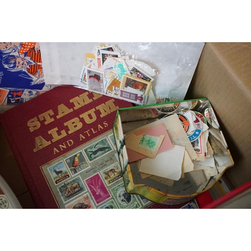 460 - A collection of British and world stamps within albums and loose examples together with stamp catalo... 