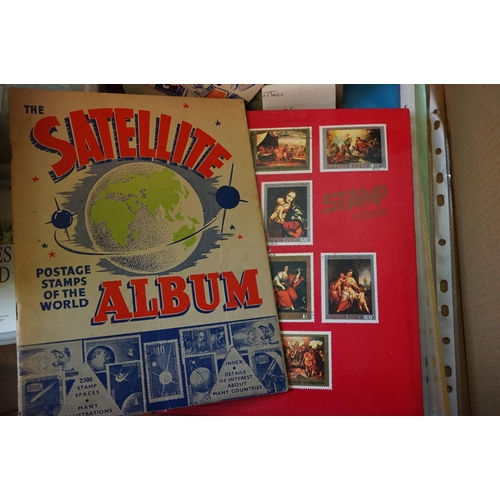 460 - A collection of British and world stamps within albums and loose examples together with stamp catalo... 