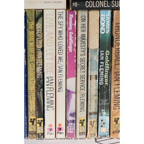 461 - A large collection of over forty Ian Fleming James Bond paperback books to include many Pan examples... 