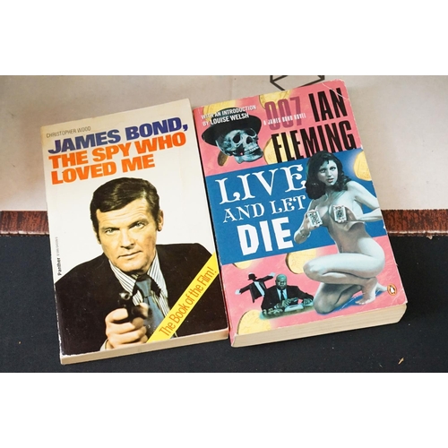 461 - A large collection of over forty Ian Fleming James Bond paperback books to include many Pan examples... 