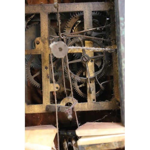 346 - A German Black Forest traditional cuckoo clock complete with weights.