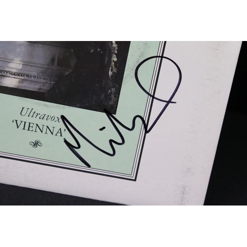 382 - Vinyl & Autographs - 20 Ultravox singles 14 of which are signed, some by the whole band including Jo... 