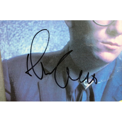 378 - Vinyl & Autographs – 16 Elvis Costello singles all signed by Elvis Costello and including rare forei... 