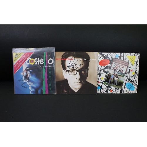 378 - Vinyl & Autographs – 16 Elvis Costello singles all signed by Elvis Costello and including rare forei... 