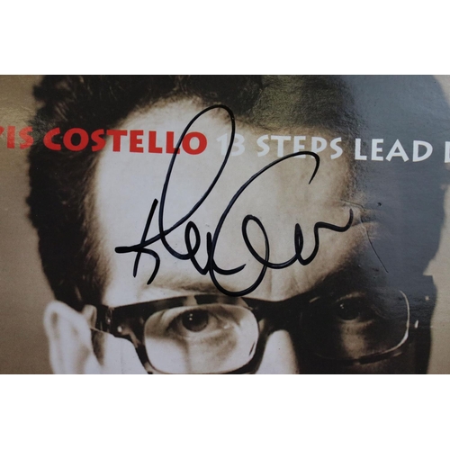 378 - Vinyl & Autographs – 16 Elvis Costello singles all signed by Elvis Costello and including rare forei... 