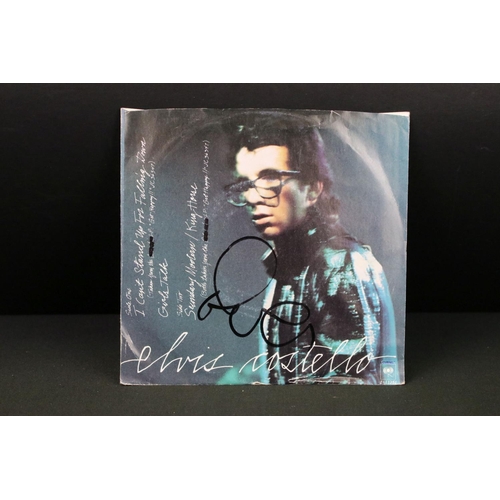 379 - Vinyl & Autographs – 16 Elvis Costello singles all signed by Elvis Costello and including rare forei... 