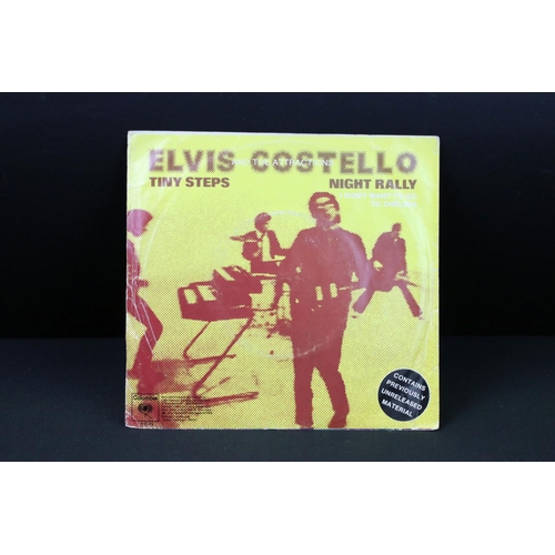 379 - Vinyl & Autographs – 16 Elvis Costello singles all signed by Elvis Costello and including rare forei... 