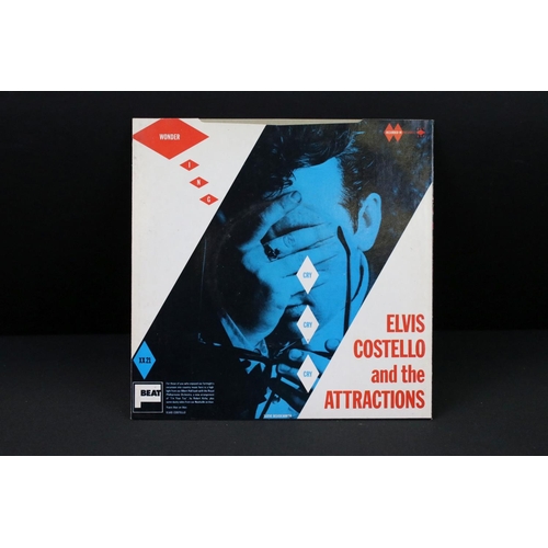 379 - Vinyl & Autographs – 16 Elvis Costello singles all signed by Elvis Costello and including rare forei... 