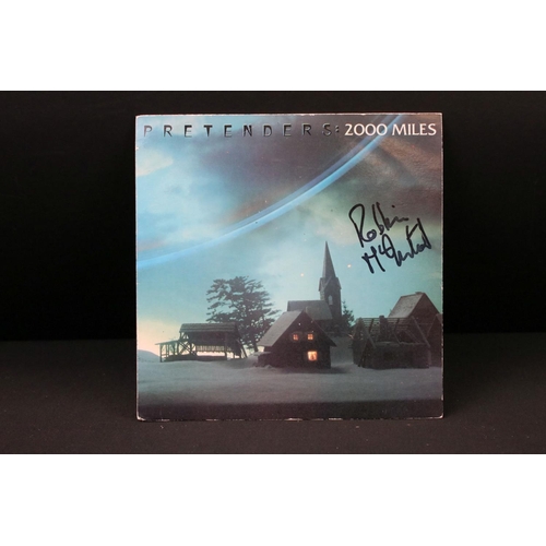 385 - Vinyl & Autographs – 7 The Pretenders / Talk Talk singles signed by band member Robbie McIntosh to i... 