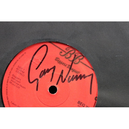 386 - Vinyl & Autographs – 2 Gary Numan singles signed by Gary Numan