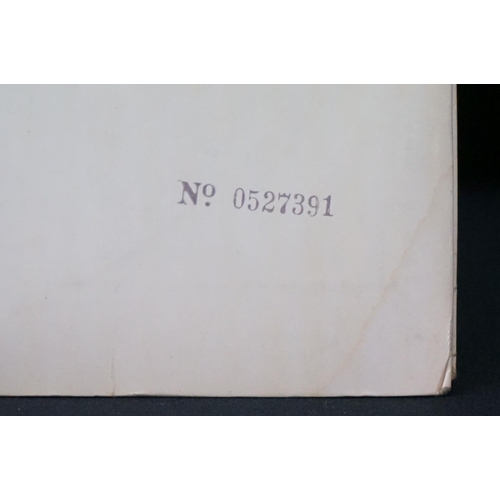 566 - Vinyl - 13 The Beatles and related LPs to include The White Album No.0527391 Stereo, top loader, wit... 