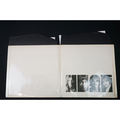 566 - Vinyl - 13 The Beatles and related LPs to include The White Album No.0527391 Stereo, top loader, wit... 