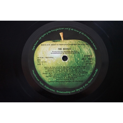 566 - Vinyl - 13 The Beatles and related LPs to include The White Album No.0527391 Stereo, top loader, wit... 