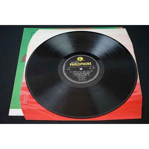 566 - Vinyl - 13 The Beatles and related LPs to include The White Album No.0527391 Stereo, top loader, wit... 