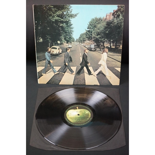 566 - Vinyl - 13 The Beatles and related LPs to include The White Album No.0527391 Stereo, top loader, wit... 