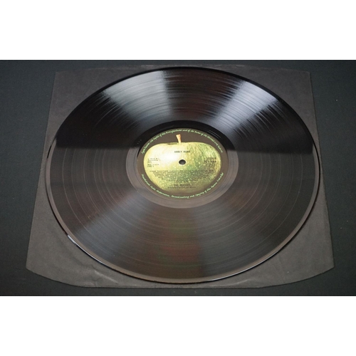 566 - Vinyl - 13 The Beatles and related LPs to include The White Album No.0527391 Stereo, top loader, wit... 