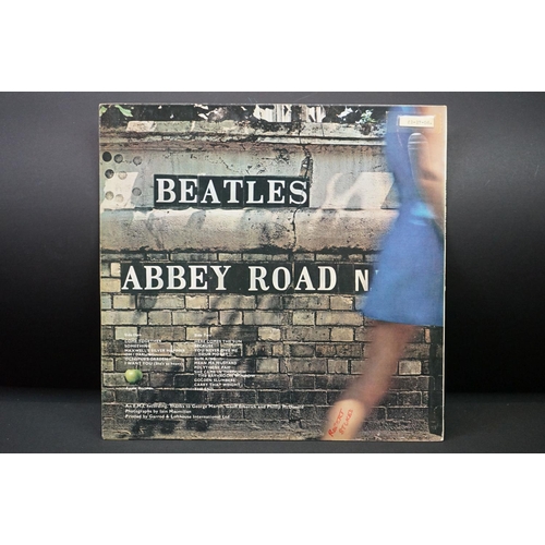 566 - Vinyl - 13 The Beatles and related LPs to include The White Album No.0527391 Stereo, top loader, wit... 