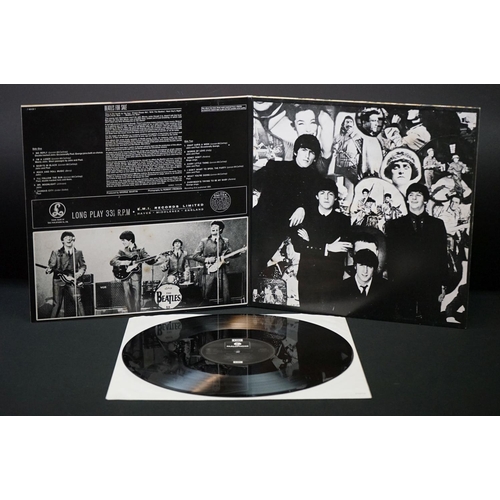 566 - Vinyl - 13 The Beatles and related LPs to include The White Album No.0527391 Stereo, top loader, wit... 