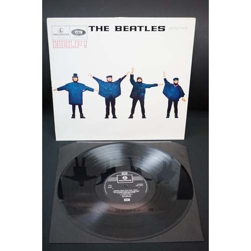 566 - Vinyl - 13 The Beatles and related LPs to include The White Album No.0527391 Stereo, top loader, wit... 