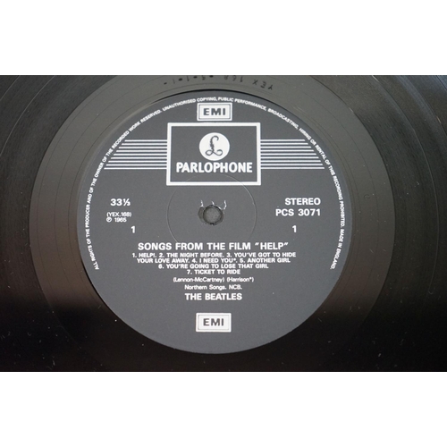 566 - Vinyl - 13 The Beatles and related LPs to include The White Album No.0527391 Stereo, top loader, wit... 