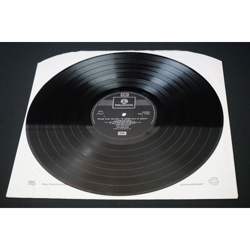 566 - Vinyl - 13 The Beatles and related LPs to include The White Album No.0527391 Stereo, top loader, wit... 