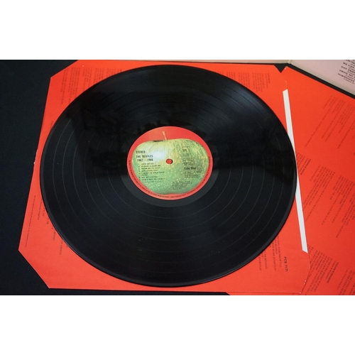 566 - Vinyl - 13 The Beatles and related LPs to include The White Album No.0527391 Stereo, top loader, wit... 