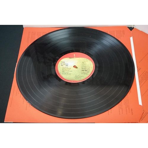 566 - Vinyl - 13 The Beatles and related LPs to include The White Album No.0527391 Stereo, top loader, wit... 