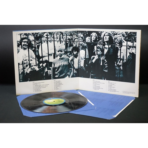 566 - Vinyl - 13 The Beatles and related LPs to include The White Album No.0527391 Stereo, top loader, wit... 