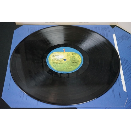 566 - Vinyl - 13 The Beatles and related LPs to include The White Album No.0527391 Stereo, top loader, wit... 