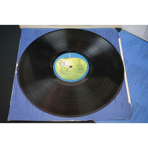 566 - Vinyl - 13 The Beatles and related LPs to include The White Album No.0527391 Stereo, top loader, wit... 