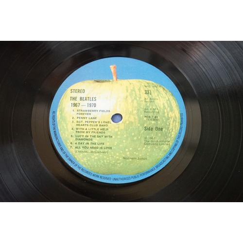 566 - Vinyl - 13 The Beatles and related LPs to include The White Album No.0527391 Stereo, top loader, wit... 