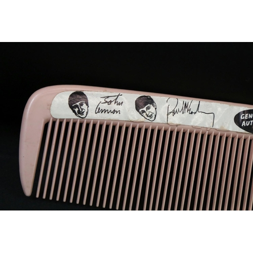 1110 - Memorabilia - An original 1960's The Beatles oversized novelty comb by Lido Toys.  The sticker has a... 