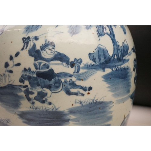 10 - Large Chinese Porcelain Blue and White Ginger Jar and Flat Cover decorated with warriors on horsebac... 