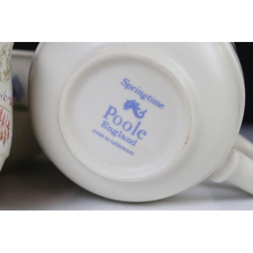 59 - Poole Pottery ' Springtime ' ware comprising 5 Tea Cups, 9 saucers, 5 tea plates, 9 breakfast plates... 