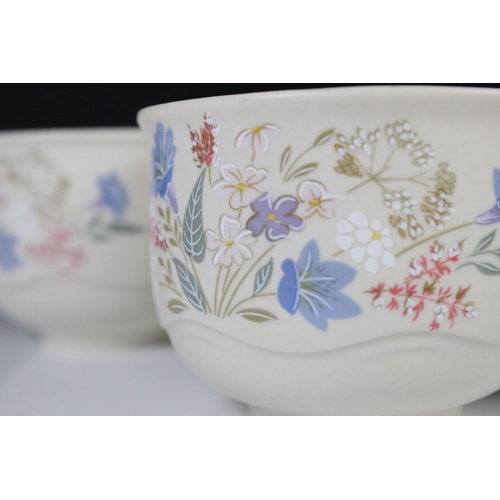 59 - Poole Pottery ' Springtime ' ware comprising 5 Tea Cups, 9 saucers, 5 tea plates, 9 breakfast plates... 