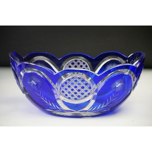 11 - Glass Blue Flash Cut Decanter and Stopper, 37cm high together with a Pair of Blue Flash Cut Decanter... 