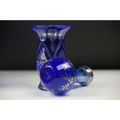 11 - Glass Blue Flash Cut Decanter and Stopper, 37cm high together with a Pair of Blue Flash Cut Decanter... 
