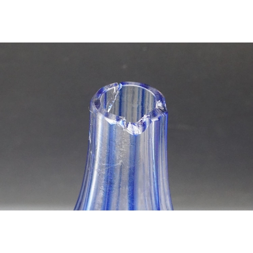 11 - Glass Blue Flash Cut Decanter and Stopper, 37cm high together with a Pair of Blue Flash Cut Decanter... 