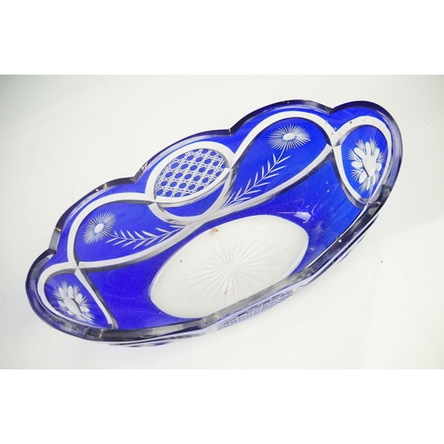 11 - Glass Blue Flash Cut Decanter and Stopper, 37cm high together with a Pair of Blue Flash Cut Decanter... 