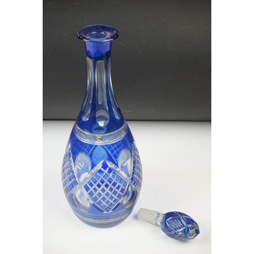11 - Glass Blue Flash Cut Decanter and Stopper, 37cm high together with a Pair of Blue Flash Cut Decanter... 