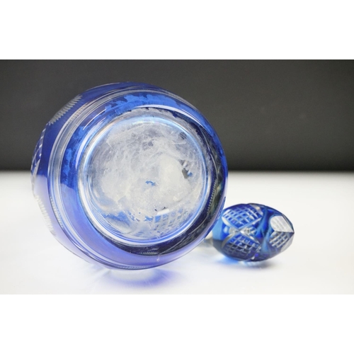 11 - Glass Blue Flash Cut Decanter and Stopper, 37cm high together with a Pair of Blue Flash Cut Decanter... 