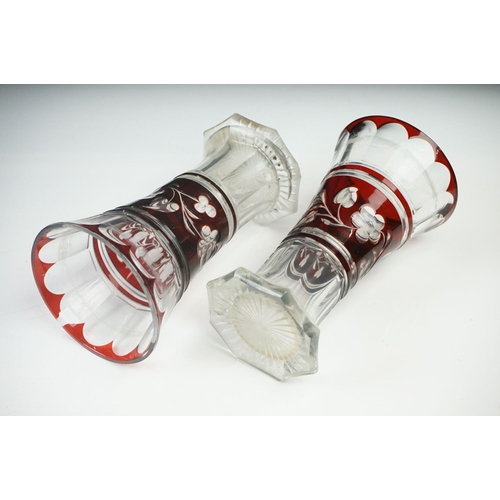 11 - Glass Blue Flash Cut Decanter and Stopper, 37cm high together with a Pair of Blue Flash Cut Decanter... 