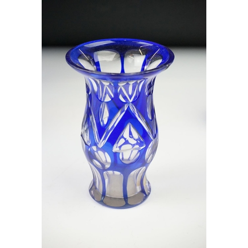 11 - Glass Blue Flash Cut Decanter and Stopper, 37cm high together with a Pair of Blue Flash Cut Decanter... 