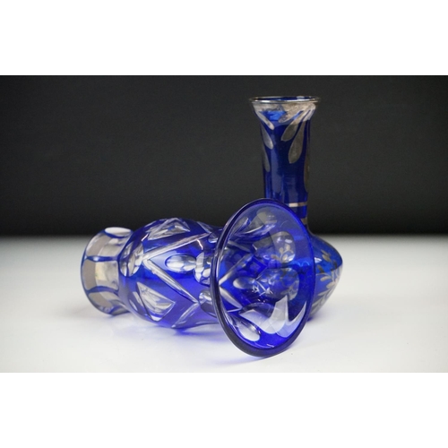 11 - Glass Blue Flash Cut Decanter and Stopper, 37cm high together with a Pair of Blue Flash Cut Decanter... 