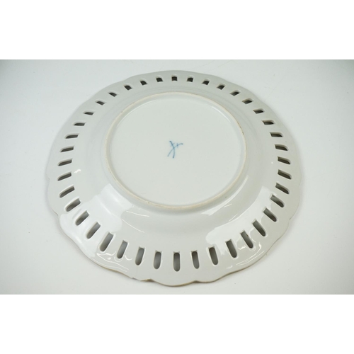 17 - Seven Meissen reticulated Plates decorated with sprays of flowers within a ribbon border and pierced... 