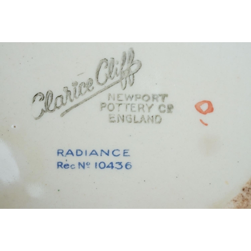 4 - Clarice Cliff Pottery Beehive Honey Pot in the Radiance pattern (damage to wing of bee), 11cm high