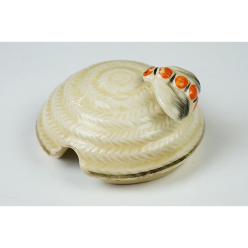 4 - Clarice Cliff Pottery Beehive Honey Pot in the Radiance pattern (damage to wing of bee), 11cm high