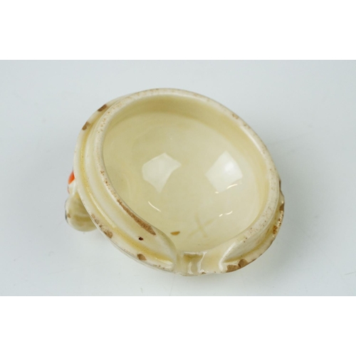 4 - Clarice Cliff Pottery Beehive Honey Pot in the Radiance pattern (damage to wing of bee), 11cm high