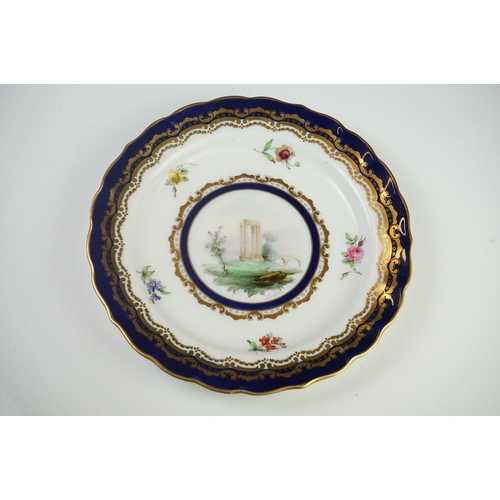 29 - Early 20th century Royal Worcester Cabinet Plate with a hand painted scene of ruins within a blue an... 